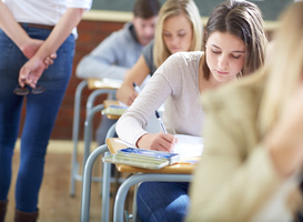 Normal_students-in-classroom-having-an-exam-2022-12-16-22-11-25-utc