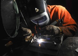 Normal_us_navy_090715-n-5821p-002_aviation_support_equipment_technician_airman_anthony_hammond_performs_tungsten_inert_gas_welding_during_a_training_evolution