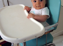Normal_kinderstoel__baby__kov__zitten