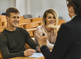 Normal_smiling-students-and-lecturer-in-auditorium-at-uni-2022-03-08-01-34-40-utc