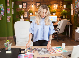 Normal_caucasian-female-designer-checking-her-interns-des-2022-07-11-16-06-53-utc