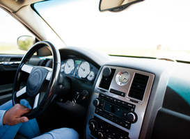 Normal_man-driving-car-hand-on-steering-wheel-2022-01-28-06-08-29-utc