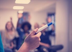 Normal_close-up-of-teacher-hand-with-marker-2022-02-01-23-43-26-utc