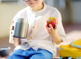 Normal_little-child-student-having-lunch-on-stairs-of-ele-2022-08-19-07-11-34-utc__1_