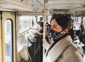 Normal_young-woman-in-public-transport-wearing-mask-cov-2022-11-14-18-16-43-utc