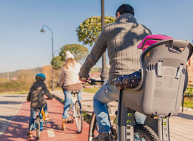 Normal_family-with-children-riding-bicycles-in-the-nature-2021-08-30-20-36-39-utc