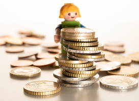 Normal_miniature-figure-building-tower-of-money-coins-2023-11-27-04-50-05-utc