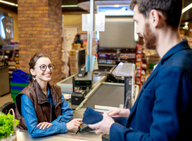 Normal_businessman-with-cashier-at-the-cash-register-2023-11-27-05-26-22-utc