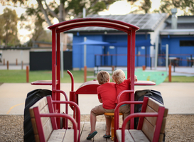 Normal_vertical-shot-of-two-white-caucasian-kids-sitting-2023-11-27-05-00-57-utc