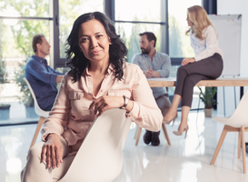 Normal_mature-asian-businesswoman-sitting-at-office-and-l-2023-11-27-05-27-05-utc