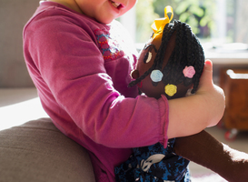 Normal_cropped-shot-of-baby-girl-in-living-room-hugging-r-2023-11-27-05-30-39-utc