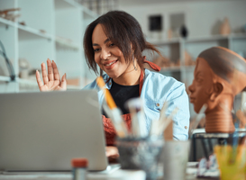 Normal_nice-female-potter-using-laptop-in-pottery-worksho-2023-11-27-04-57-37-utc