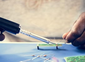 Normal_closeup-of-tin-soldering-with-electronics-circuit-2023-11-27-04-58-41-utc