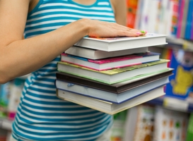 Normal_girl-holding-a-stack-of-books-or-textbooks-back-t-2023-11-27-05-30-36-utc