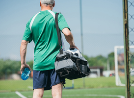 Normal_back-view-of-old-man-with-sportive-water-bottle-an-2023-11-27-05-33-24-utc