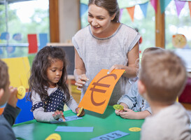 Normal_teacher-and-pupils-counting-euro-currency-at-nurse-2024-06-05-04-58-15-utc