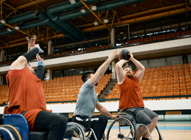 Normal_player-in-wheelchair-taking-a-shot-on-while-rivals-2023-11-27-05-29-16-utc