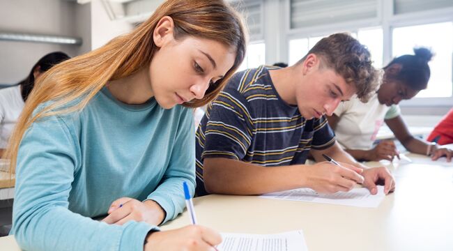 Carousel_group-of-students-attentively-taking-a-test-in-a-c-2023-11-27-05-24-40-utc