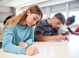 Normal_group-of-students-attentively-taking-a-test-in-a-c-2023-11-27-05-24-40-utc