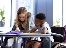 Normal_happy-diverse-schoolgirl-and-schoolboy-in-wheelch-2023-11-27-04-50-00-utc