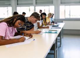 Normal_group-of-high-school-students-doing-an-exam-in-cla-2024-04-04-17-39-21-utc