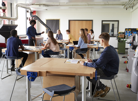 Normal_class-of-high-school-students-sitting-at-work-benc-2023-11-27-04-58-30-utc