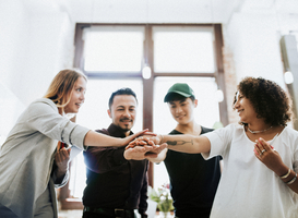 Normal_diverse-startup-business-team-stacking-hands-2023-11-27-05-03-24-utc