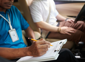 Normal_driving-instructor-filling-evaluation-checklist-2023-11-27-05-18-15-utc