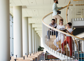 Normal_group-of-students-discussing-in-university-2023-11-27-05-00-52-utc