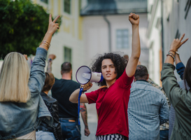 Normal_group-of-people-activists-protesting-on-streets-s-2023-11-27-05-24-44-utc