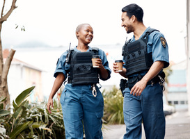 Normal_police-conversation-and-team-on-a-coffee-break-af-2023-11-27-05-29-21-utc