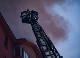 Normal_firefighter-on-pull-out-crane-put-out-a-fire-in-a-2023-11-27-05-21-18-utc