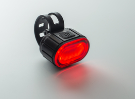 Normal_red-bicycle-rear-lamp-on-background-front-view-2024-03-13-12-03-25-utc