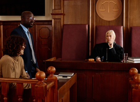 Normal_confident-experienced-female-judge-sitting-in-fron-2023-11-27-04-58-52-utc