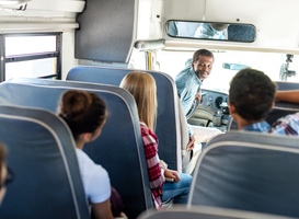 Normal_group-of-teen-scholars-riding-school-bus-and-talki-2023-11-27-04-59-44-utc