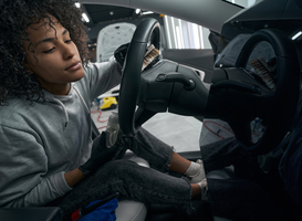 Normal_auto-detailer-soaping-and-brushing-car-interior-su-2023-11-27-05-24-45-utc