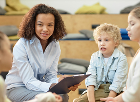 Normal_smiling-black-woman-listening-to-children-in-suppo-2024-02-07-06-00-46-utc