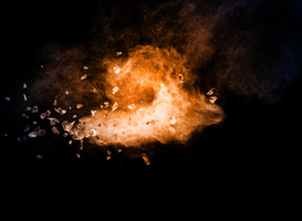 Normal_split-debris-of-stone-exploding-with-orange-dust-a-2024-11-25-11-50-50-utc