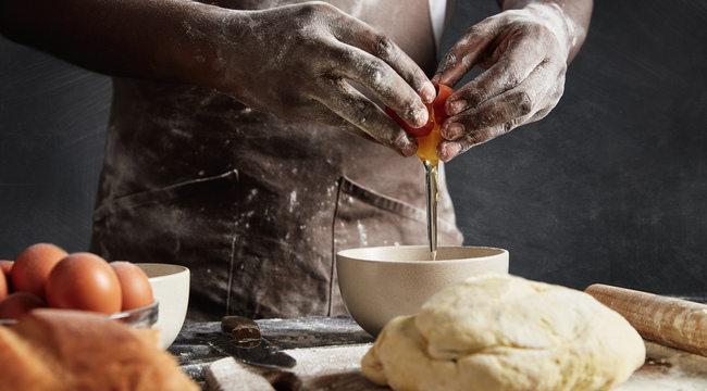 Carousel_man-s-hands-break-egg-in-bowl-as-prepares-pastry-2025-01-24-04-24-56-utc
