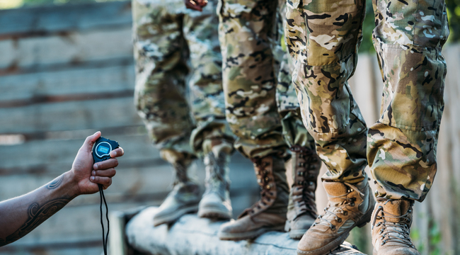 Carousel_partial-view-of-tactical-instructor-with-stop-watc-2024-11-17-21-37-31-utc
