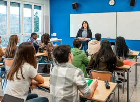 Normal_high-school-teacher-giving-lesson-to-diverse-group-2025-03-30-07-02-24-utc