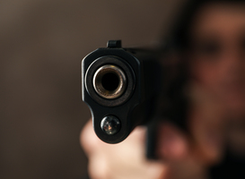 Normal_man-hold-pistol-selective-focus-robber-violence-2025-04-02-13-38-31-utc