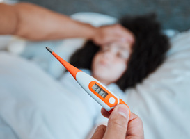 Normal_thermometer-temperature-and-parent-with-a-sick-ch-2025-04-06-11-40-55-utc
