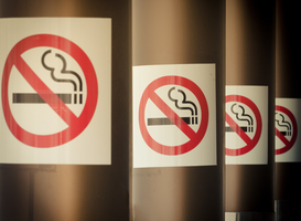 Normal_row-of-no-smoking-signs-on-series-of-columns-2025-01-09-06-10-08-utc