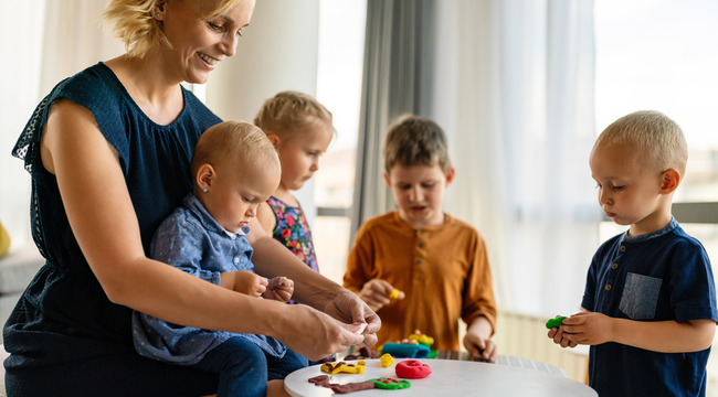 Carousel_nursery-children-having-fun-and-playing-with-teach-2025-03-14-21-42-40-utc