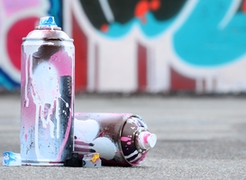 Normal_several-used-spray-cans-with-pink-and-white-paint-2025-03-15-16-17-25-utc