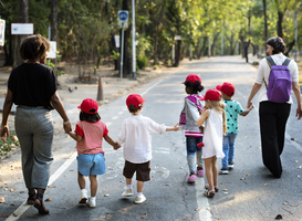 Normal_little-kids-with-teacher-walking-together-field-t-2025-02-10-10-15-49-utc