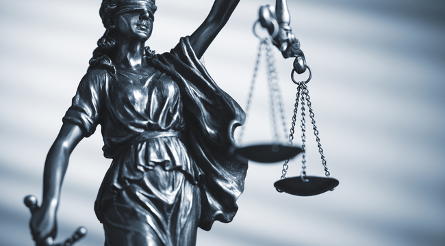 Carousel_figure-of-justice-holding-scales-and-a-sword-2025-01-07-12-06-05-utc