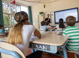 Normal_group-of-students-paying-attention-to-their-teache-2025-04-04-14-25-19-utc