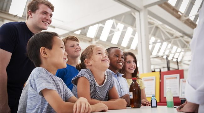 Carousel_group-of-kids-with-teachers-having-fun-at-a-scienc-2024-10-19-08-56-36-utc